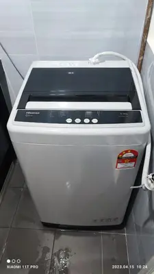 a white toaster oven sitting on top of a floor at kakao homestay ipoh town 2parking 3room 10pax wifi in Ipoh
