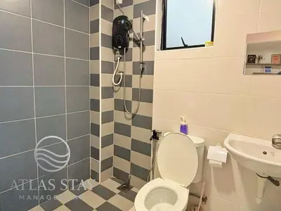 a bathroom with a shower with a toilet and a sink at IPOH Waterpark Homestay By SummerStay in Ipoh