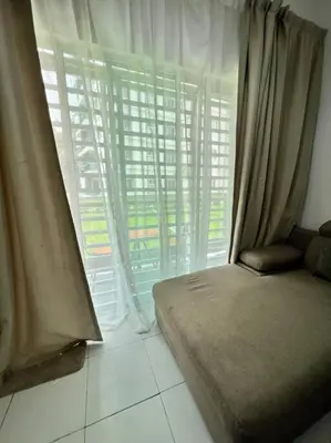 a bedroom with a bed and a large window at Lily King (modern and comfy) in Tanah Rata