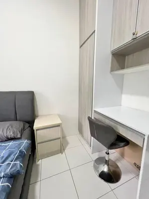 a room with a bed and a desk and a chair at Lily King (modern and comfy) in Tanah Rata