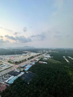 an aerial view of a city with buildings and roads at Manjung Vermogen Stay-Wi-Fi+KTV(Near Aeon) in Sitiawan