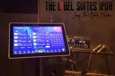 a laptop computer sitting on top of a sound mixer at The Label Suites Ipoh in Ipoh