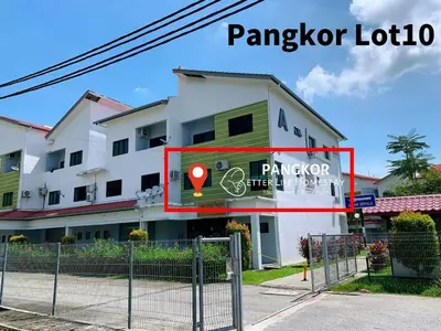 a building with a sign in front of it at Better Life Apartment near beach-2room 2bathroom 6pax in Pangkor