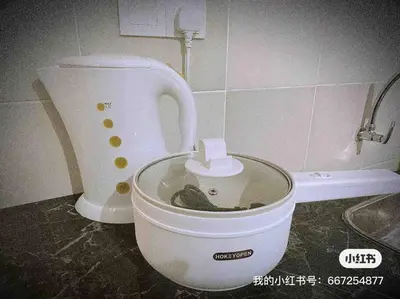 a toilet with its lid up in a bathroom at Nordic Home Falim 31 Astro in Ipoh