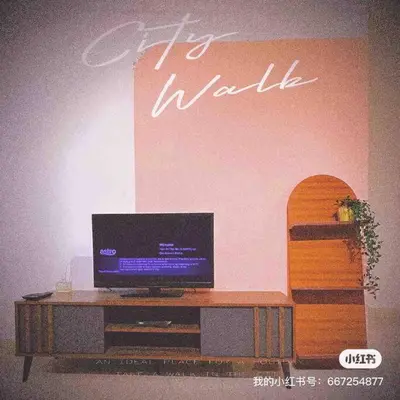 a television sitting on a wooden table in a room at Nordic Home Falim 31 Astro in Ipoh