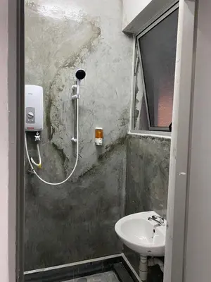 a bathroom with a shower and a sink at SmileHome at Cameron Brinchang - KEA FARM in Brinchang