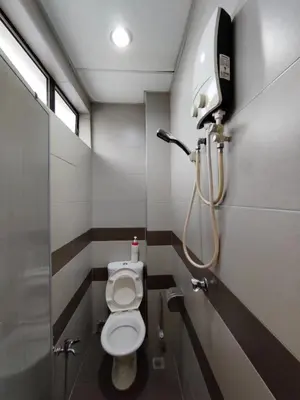 a bathroom with a toilet and a shower at CLP perai homstay in perai in Perai