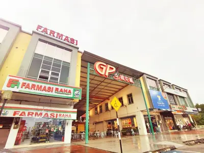 a building on the side of a street at 1 Day Car Hotel - BG Perdana in Batu Gajah