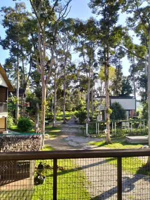 a view of a park from a fence at D'RUMAH BONDA RIVER VIEW Kuala Kangsar in Kampong Senawar